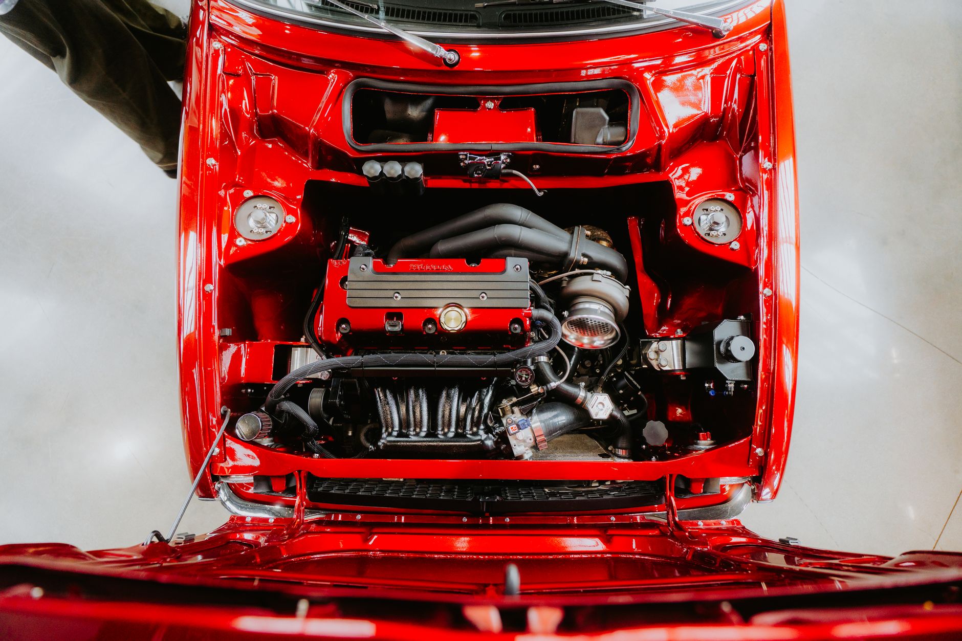 After: Clean engine bay after service with fluids topped up